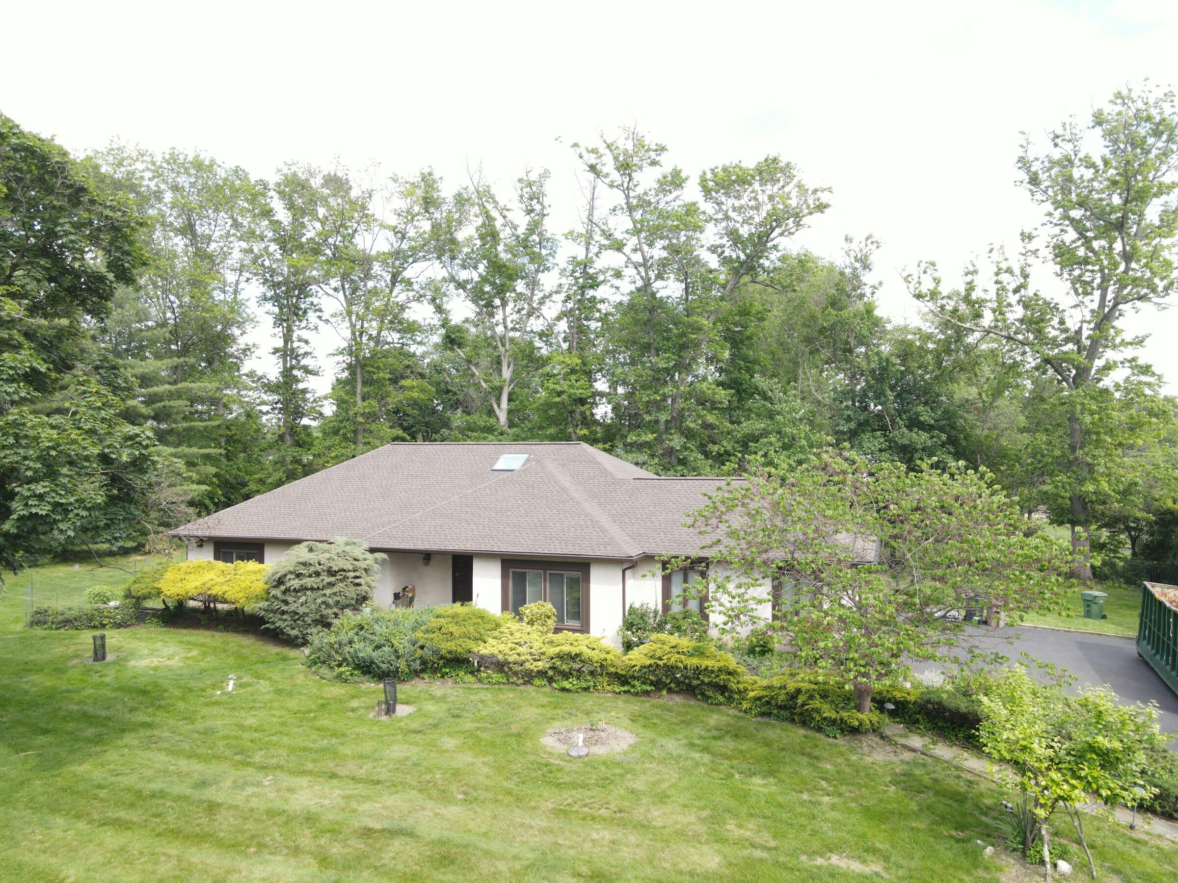 A residential reroof in progress, illustrative